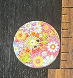 3/4 inch round, wooden, two hole button. White with printed picture.