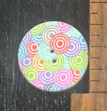 3/4 inch round, wooden, two hole button. White with printed picture.