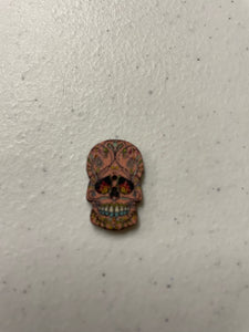 1 inch wooden button, two hole, day of the dead Orange sugar skull.