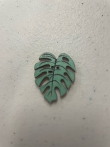 1 inch Shaped wooden button with 2holes. Turquoise Palm Leaf