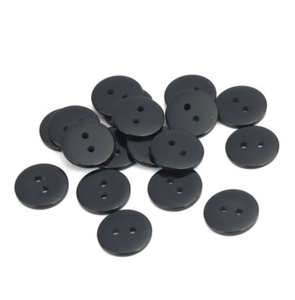 1 Inch round, two hole disk button made of Resin. Black