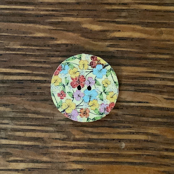 3/4 inch round, wooden, two hole button. White with printed picture.