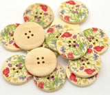 1 1/8 inch round wooden button with two holes. Feathering wild Flowers